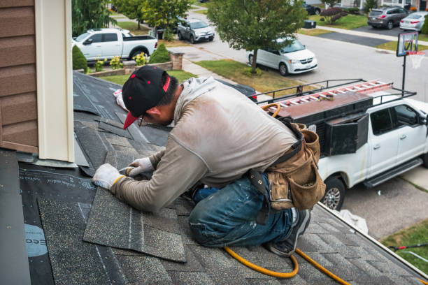 Professional Roofing technician working in Lancaster, NH